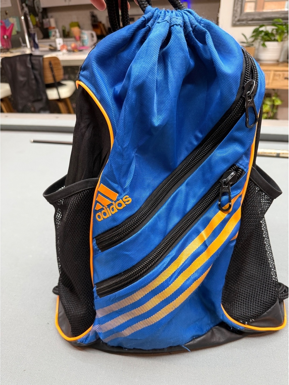 Adidas Blue and Orange Drawstring Backpack with Side Mesh Pockets